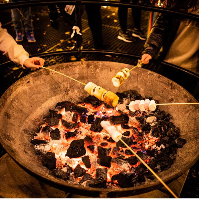 Marshmallows roasting over a fire